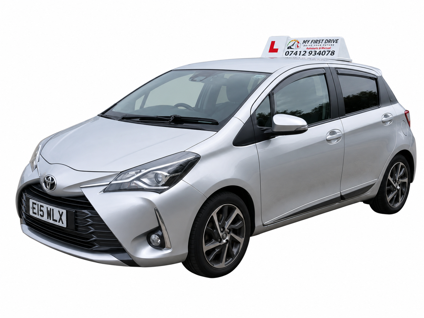Silver manual dual-control learner car with My First Drive roof sign